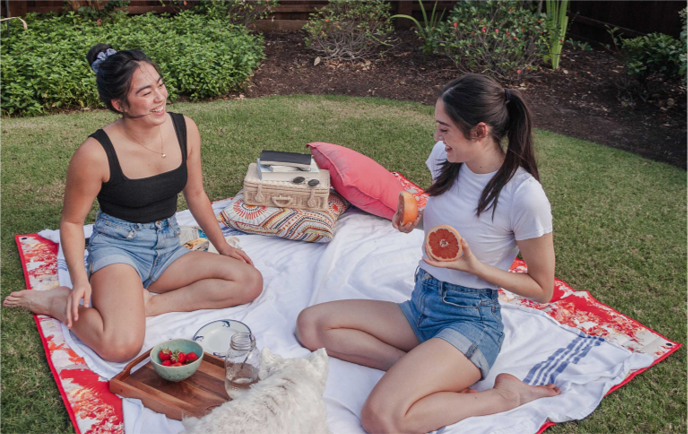 two girls having a picnic